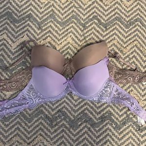 Never worn Tan and Purple Lace Bra’s